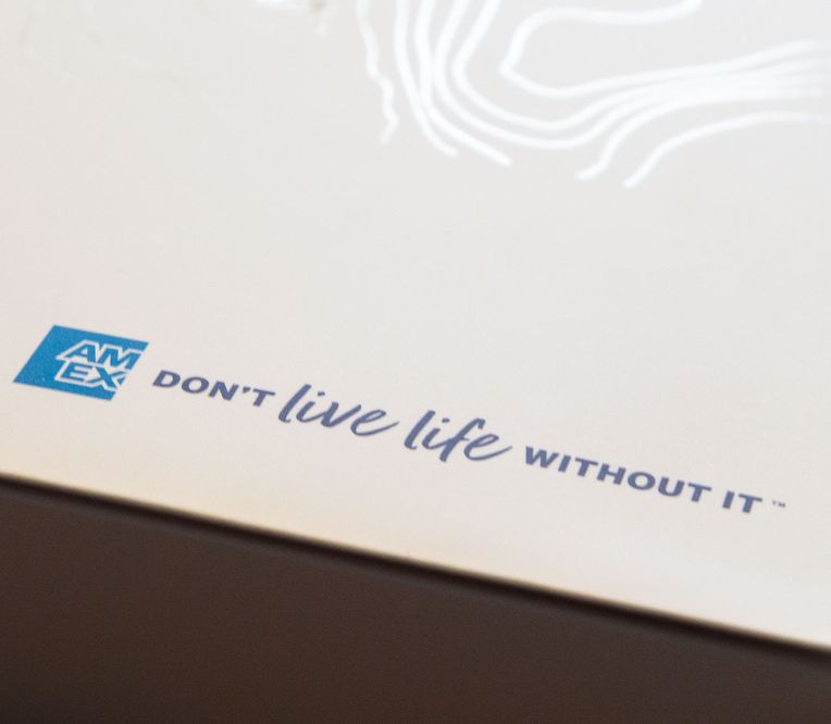 Innenbox des American Express Golf Mailings mit Aufschrift "Don't live life without it"